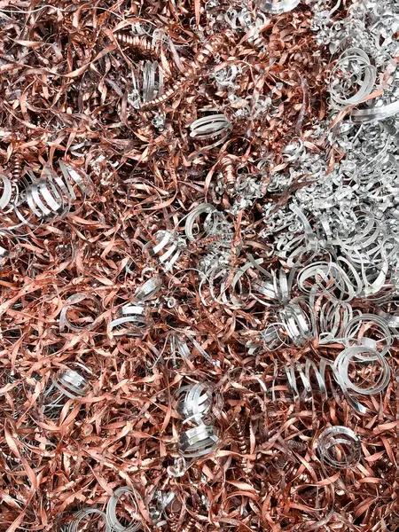 stock image Portrait view of some copper turnings mixed with aluminium turnings ready to be recycled. High quality photo