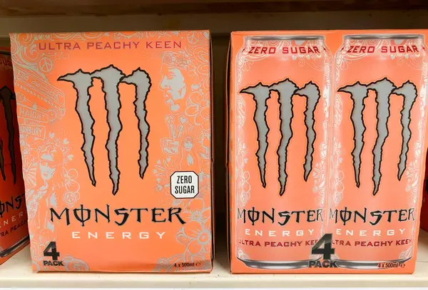 stock image St Neots, UK - Saturday 15th June 2024: Cans of Monster energy peach drink. High quality photo