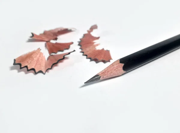Picture of a pencil that has been sharpened and ready to be used to write in a notebook 2