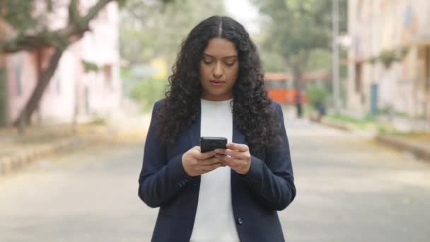 Serious Curly Hair Indian Businesswoman Scrolling — Stok Video