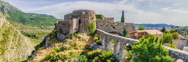 stock image Old city Sunny view of ruins of citadel in Stari Bar town near Bar city, Montenegro. Drone view. BANNER, LONG FORMAT