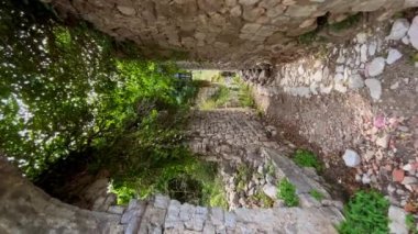 Vertical video. The ruins of the Bar old city or Stari Grad. A destroyed ancient settlement close to the city of Bar. Travel destinations of Montenegro.