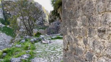 Ruins of a church in an abandoned city in mountans above the city of Kotor. Hiking in Montenegro.