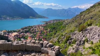 View on the city of Kotor from a mountain road leading to an abandoned old town. Hiking in Montenegro concept.