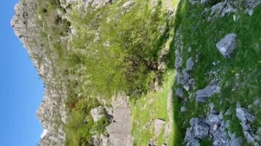 Hiking in mountains above the city of Kotor. Travel to Montenegro concept.