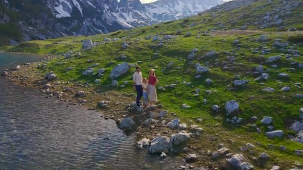 Young Family Captures Outdoor Adventure Using Drone Camera Father Mother — Wideo stockowe
