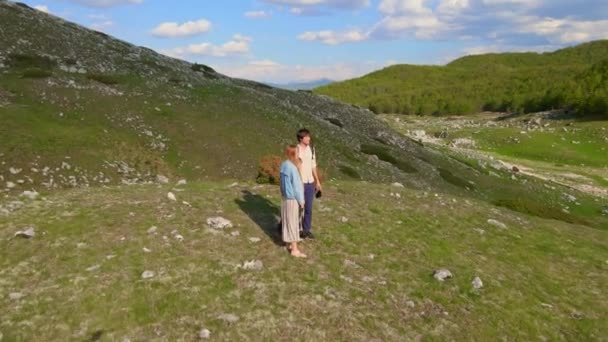 Young Family Captures Outdoor Adventure Using Drone Camera Father Mother — Stockvideo