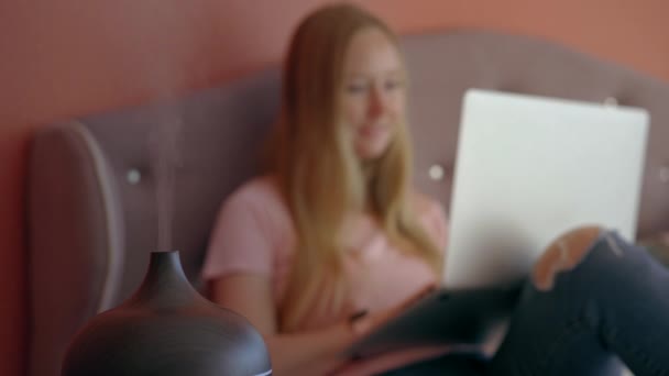 Young Woman Seen Sitting Comfortably Bed Working Her Laptop While — Vídeo de stock