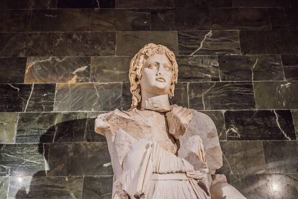 Close up of Ancient Greek Roman sculpture of goddess.