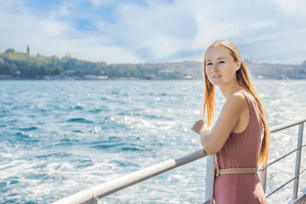 stock image Happy woman enjoying the sea from ferry boat crossing Bosphorus in Istanbul. Summer trip to Istanbul.