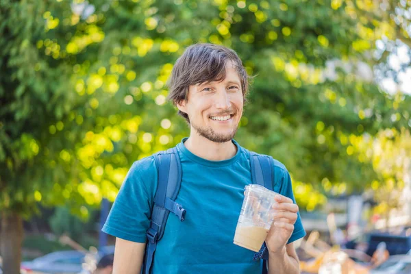 Man Holding Iced Coffee Plastic Cup — Stock Photo, Image