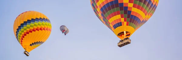 Beautiful hot air balloons over blue sky. BANNER, LONG FORMAT