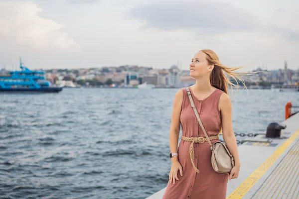 stock image Woman tourist enjoying Galataport area view, cruise port of Istanbul newly opening in 2021, located in the shores of the Galata, Karakoy in Istanbul.