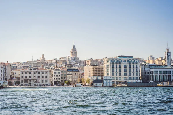 stock image Istanbul city skyline in Turkey, Beyoglu district old houses with Galata tower on top, view from the Golden Horn.