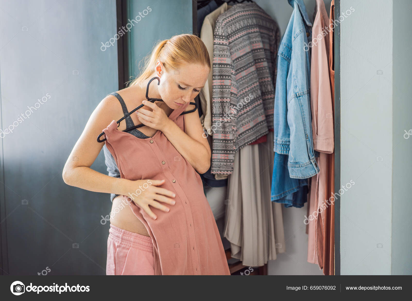 Pregnant Woman Has Nothing Wear Pregnant Woman Stands Front Closet Stock  Photo by ©galitskaya 659076092