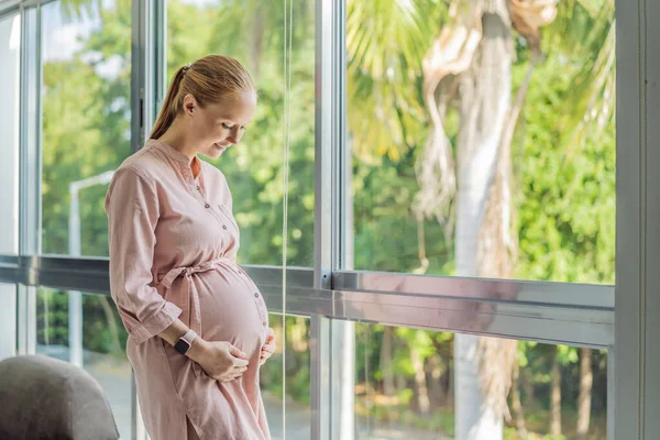 Pregnant Woman Has Nothing Wear Pregnant Woman Stands Front Closet Stock  Photo by ©galitskaya 654213416