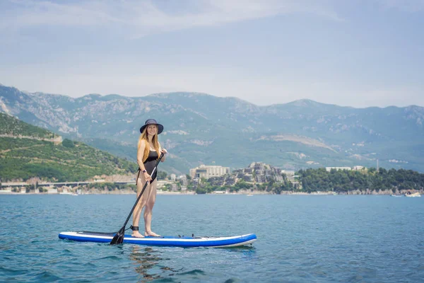 Young Women Having Fun Stand Paddling Blue Water Sea Montenegro — Stock Photo, Image