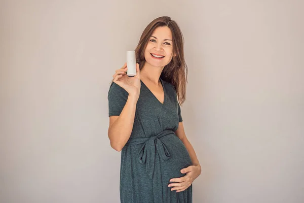 Confident Radiant Pregnant Woman Showcasing Debate Pregnancy Deodorant Good Bad Stock Photo