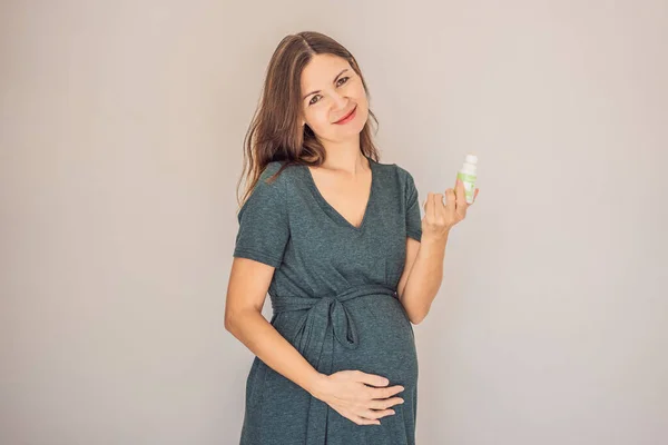 Confident Radiant Pregnant Woman Showcasing Debate Pregnancy Deodorant Good Bad Royalty Free Stock Images