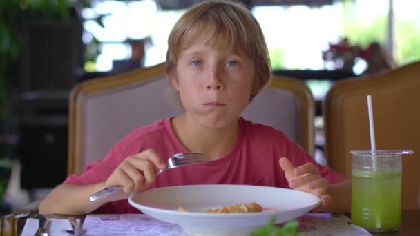 Little Boy Eating Cafe Eating Fried Dumplings — Stock Video