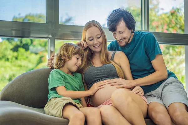 Expectant Parents Mom Dad Eldest Son Share Heartwarming Moment Sofa — Stock Photo, Image