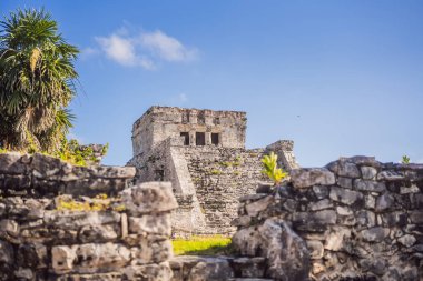 Pre-Columbian Mayan walled city of Tulum, Quintana Roo, Mexico, North America, Tulum, Mexico. El Castillo - castle the Mayan city of Tulum main temple. clipart