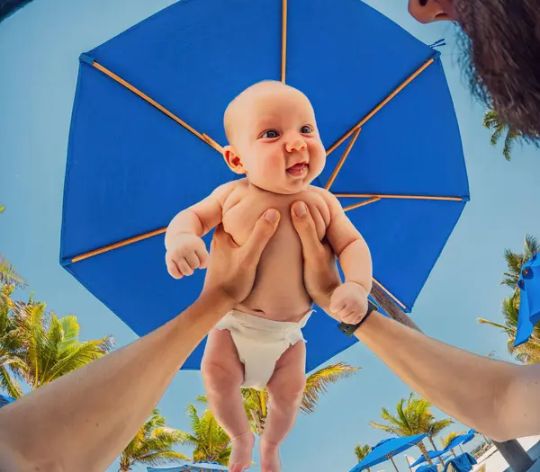 Dad Baby Share Tender Moment Beach Umbrella Palm Trees Framing — Stock Photo, Image