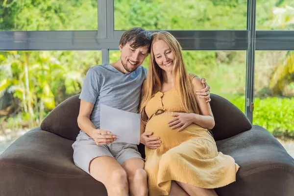 Joyful Husband His Pregnant Wife Share Moment Excitement Smiling While — Stock Photo, Image