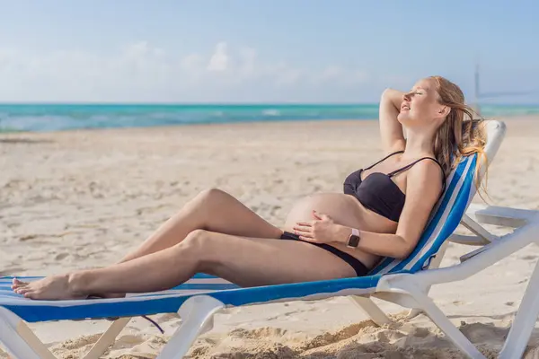 Basking Seaside Tranquility Pregnant Woman Lounges Sun Lounger Embracing Soothing Stock Picture