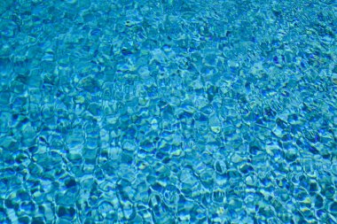 Su dokusu. Yüzme havuzu manzarası. Mavi su arka planı. Mavi su dokusu arka planı. Havuz suyunun yüzeyi