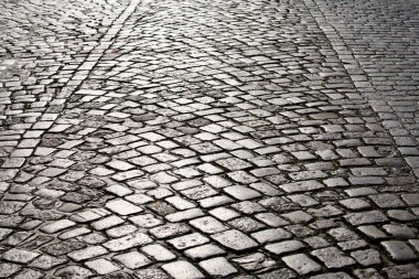 Çakıl taşı kaldırım arka planı. Parke taşlı yolun desenli arka planı. Arka plan için kaldırım taşı. Çakıl taşı yol arkaplanı