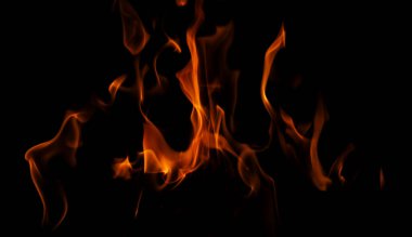 Siyah arka planda yangın alevleri. Ateş alevi dokusu. Fotokopi alevi. Alevler arka planda. Siyah arkaplanda alevler