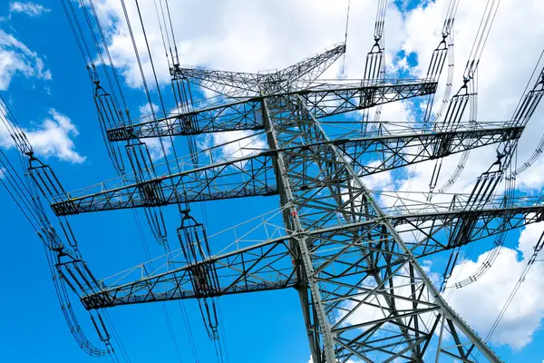 stock image Electricity transmission. High power electricity poles. Transmission lines over sky. Transmission towers. Distribution of energy. Energy transmission concept. High voltage supply