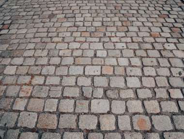 Çakıl taşı kaldırım arka planı. Parke taşlı yolun desenli arka planı. Arka plan için kaldırım taşı. Çakıl taşı yol arkaplanı