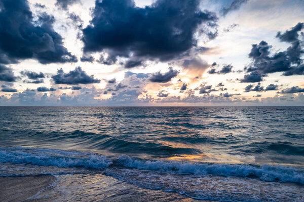 Seascape with dramatic sky and colorful clouds. Sky over sea water landscape. Stormy dramatic sky. Scenic seascape at sea