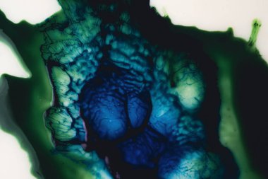 Renk sıçrama arkaplanı. Renkli boya. Renkli arka plan. Sıvı akışkan sanat özgeçmişi. Mavi akrilik boya. Soyut arkaplan. Renkli akrilik boya. Dönen mürekkep. Boya Rengi sıçraması