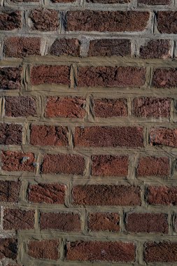 Asma yol. Bricks Yolu 'nun arka planı. Taş kaplama kaldırım. Tuğla yüzey. Sert tuğlalı yol. Çakıl taşı kaldırım arka planı. Dokulu arka plan. Kaldırımda. Eski kaldırım taşı yolu