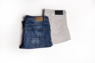 Bir çift kot pantolon. Mavi kot arka planı. Kot pantolon pantolonu. Arkaplan için Denim dokusu. Denim kot dokusu
