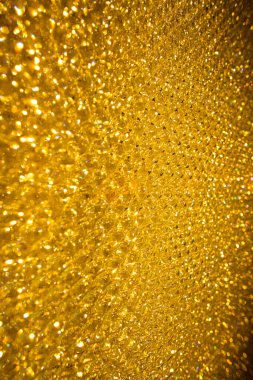 Altın bokeh. Bokeh altın arka planı. Altın bokeh arka planı. Kopyalama alanı olan soyut arkaplan. Tatil geçmişleri