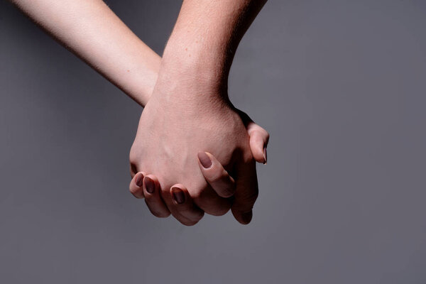 Couple in love. Romantic couple holding hands. Couple sensual touch. Hands of lovers. Hands of love. Sensual hands concept. Tender couple. Romance