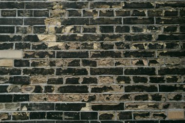 Duvar önü, duvar tasarımı. Pankart olarak tuğla desenli duvar. Taş duvar dokusu. Tuğla