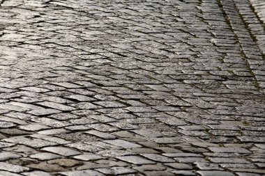 Çakıl taşı kaldırım arka planı. Parke taşlı yolun desenli arka planı. Arka plan için kaldırım taşı. Çakıl taşı yol arkaplanı