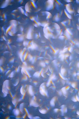 Mavi bokeh parıltısı. Bokeh etkisi parlıyor. Bokeh ile bulanık arkaplan