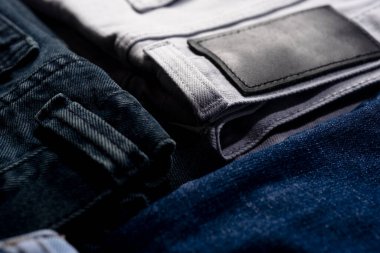 Arkaplan deseni için kot kumaşı. Kot pantolon deseni. Kot pantolon desenli. Kumaş desenli arkaplanlar