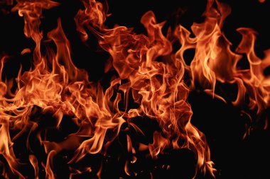 Sancak arkaplanı için soyut alev alev dokusu. Siyah arka planda yangın alevleri. Ateş alevi dokusu. Fotokopi alevi arka planında. Yanan ateş konsepti