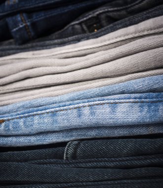 Arkaplan tasarımı için Denim dokusu. Kot pantolon deseni. Denim satışları. Kotun kumaş dokusu. Pantolon pantolonu. Mavi kot elbise.