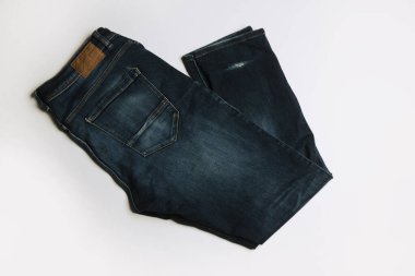 Pantolon arka planı. Kot pantolon pantolonu. Arkaplan için Denim dokusu. Denim kot kumaşı. Uzayı kopyala Reklamcılık. Kot pantolon dokusu veya kot arka planı