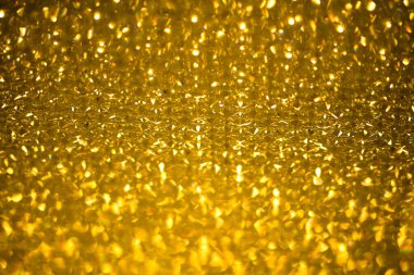 Altın bokeh. Bokeh altın arka planı. Altın bokeh arka planı. Kopyalama alanı olan soyut arkaplan. Tatil geçmişleri. Parıltılı pankart