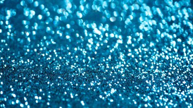 Mavi bokeh rengi bulanık arkaplan. Mavi bokeh. Tatil geçmişleri. Kopyalama alanı olan soyut arkaplan. Bokeh parlak arka plan. Gümüş bokeh arkaplanı
