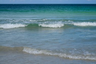 Ocean beach and summer seascape. Waves at sandy beach. Seascape at evening. Scenic seascape